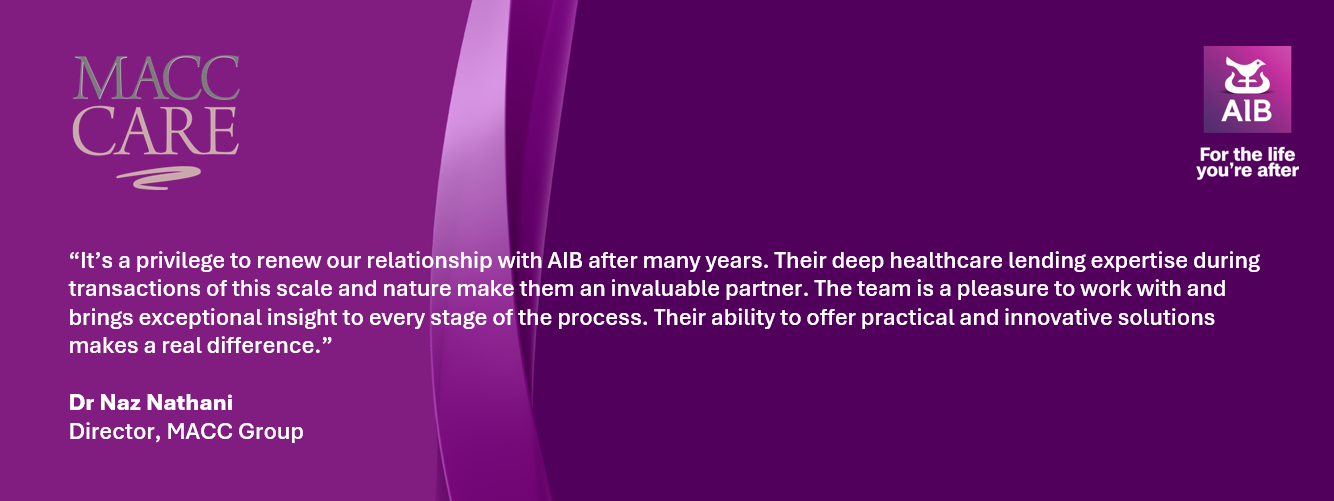 two people holding co-ownership sign