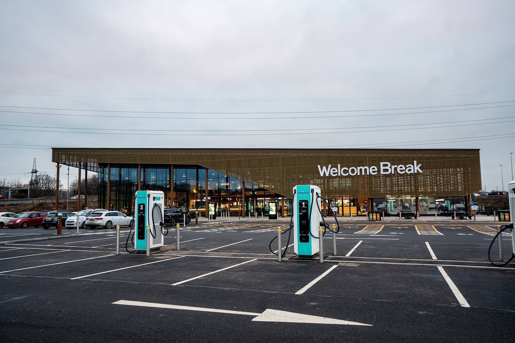 two people holding co-ownership sign
